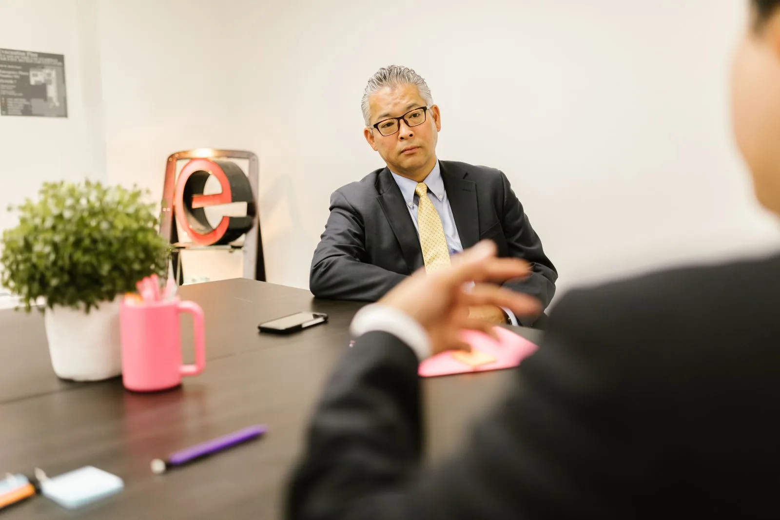 Two people having a business meeting in an office