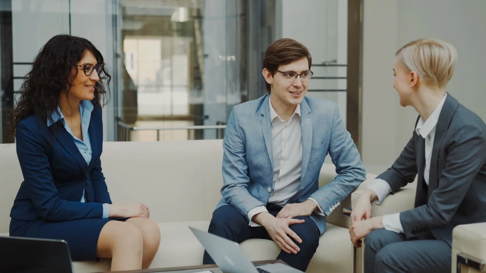 Business professionals discussing strategy in a modern office